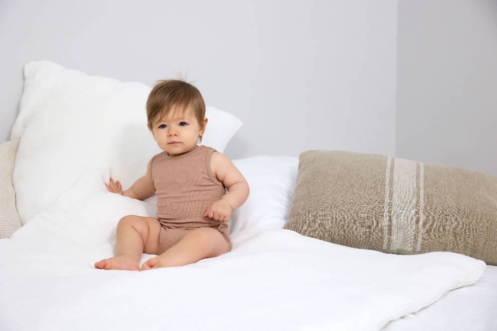 Lässig Baby Body - Ärmellos gerippt, Hellbraun zollfrei