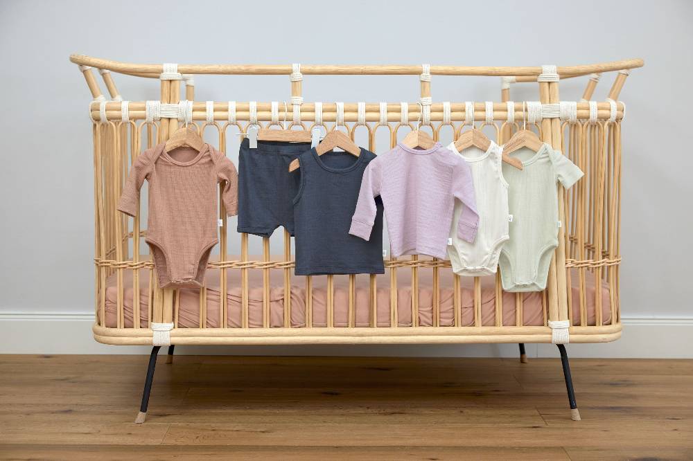 Lässig Baby Body - Ärmellos gerippt, Milky Outlet